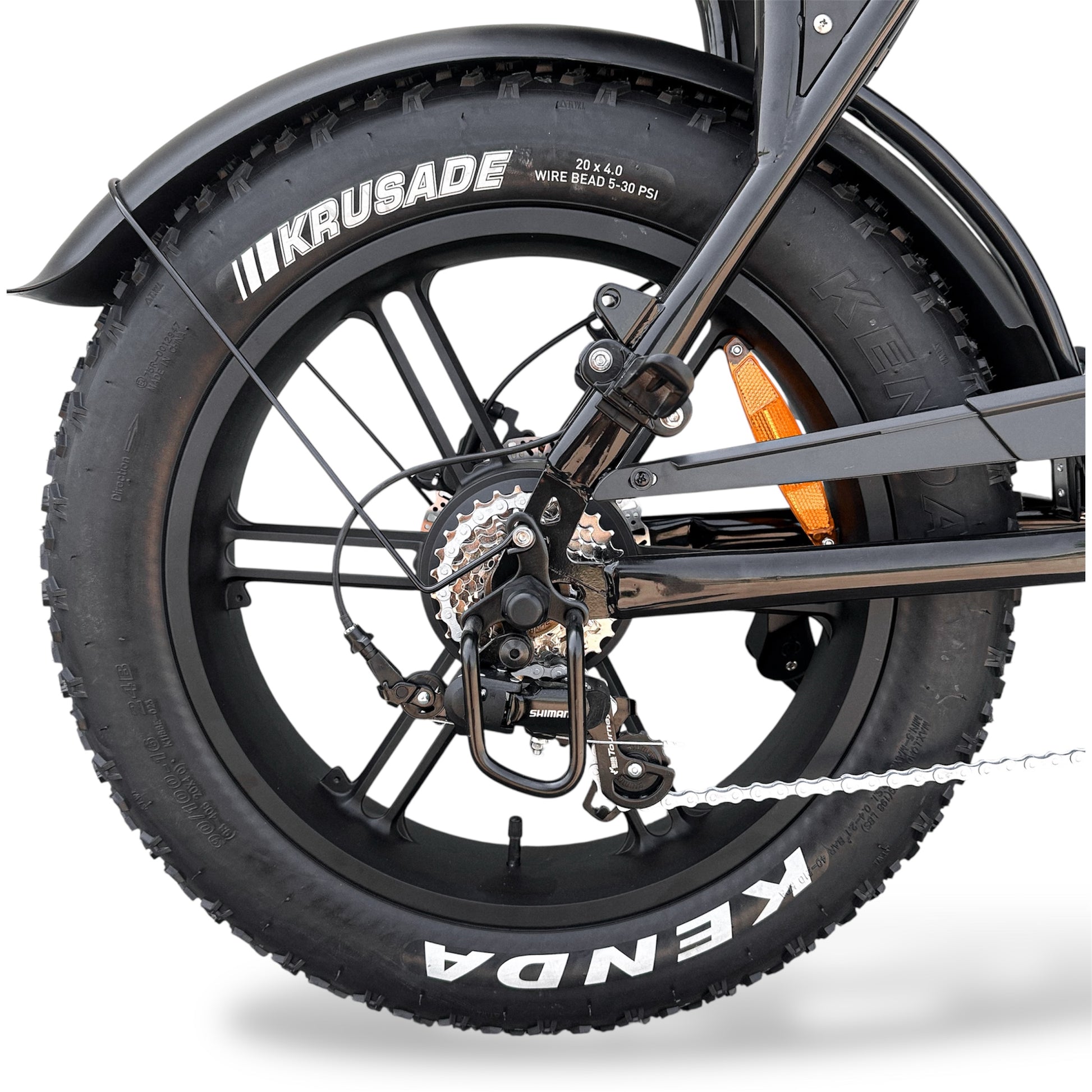 Close-up of a Dalat V1 Ebike's Hub Motor with Kenda Krusade branding Tire on a white background