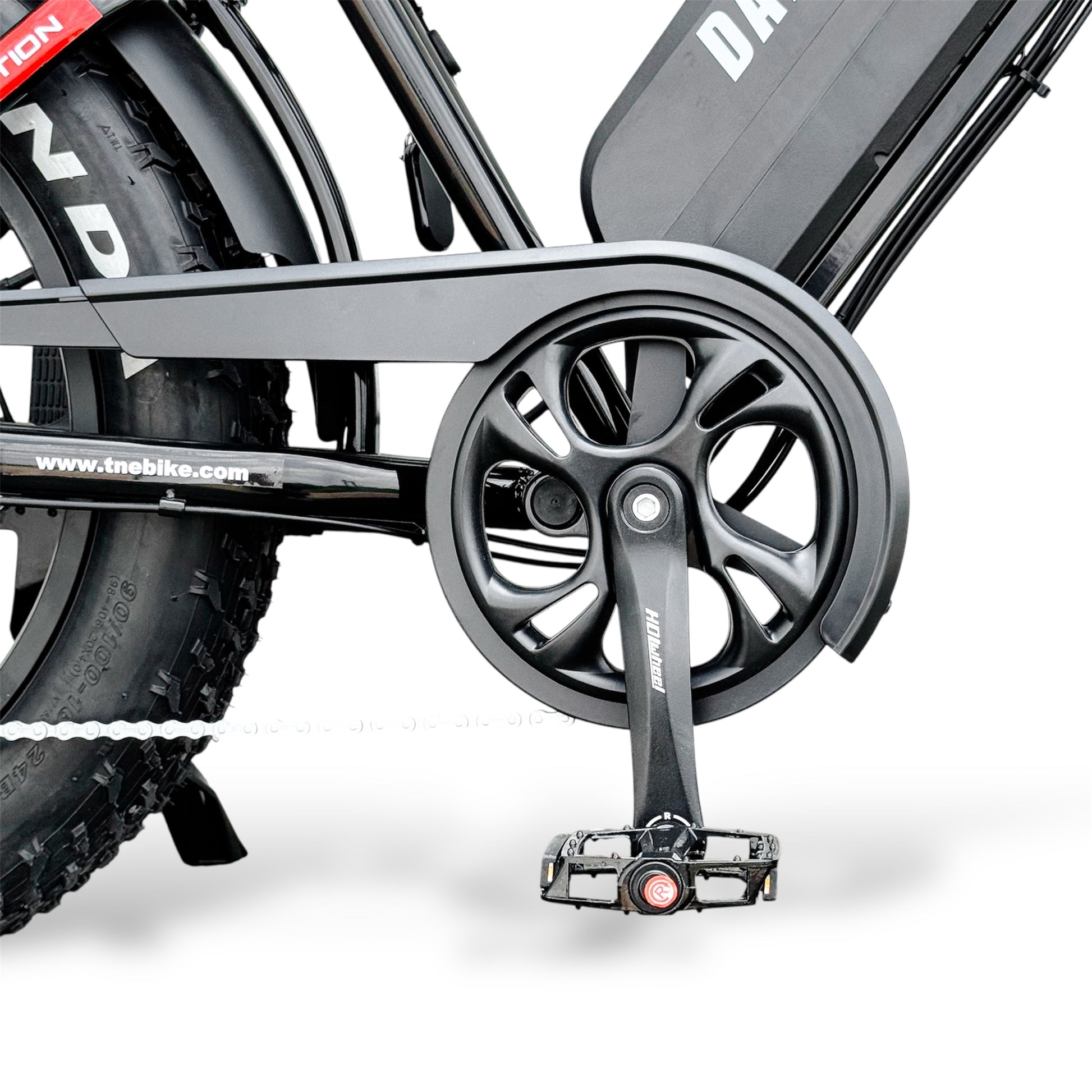 Close-up of a bicycle drive chain and gear system on a white background