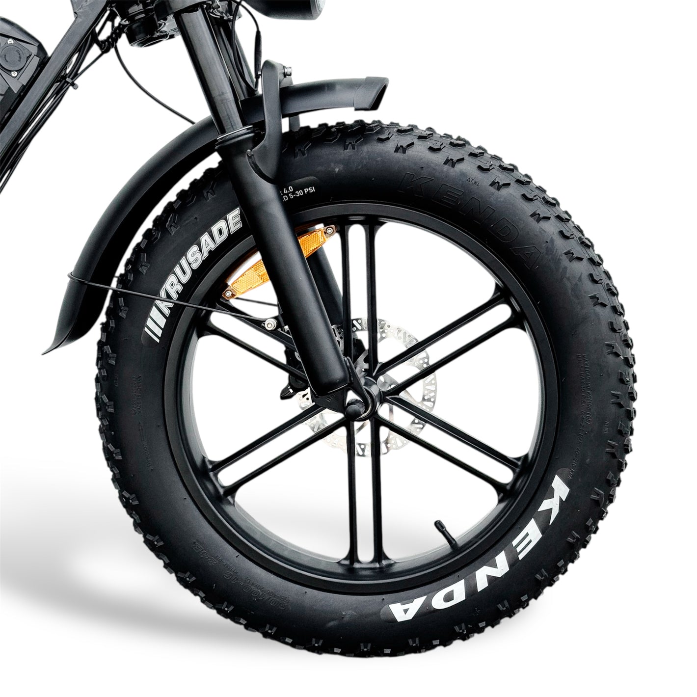 Close-up of a Dalat V1 Ebike wheel with Kenda tire on a white background