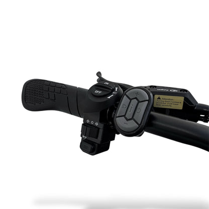 Close-up of a black Ebike handlebar with control buttons on a white background